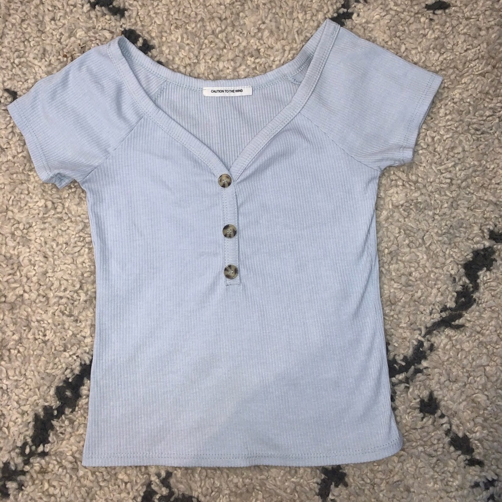 light blue caution to the wind short sleeve shirt